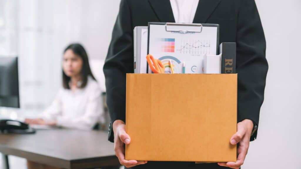 Internal IT vs Outsourcing debate, man quitting his job and taking his items
