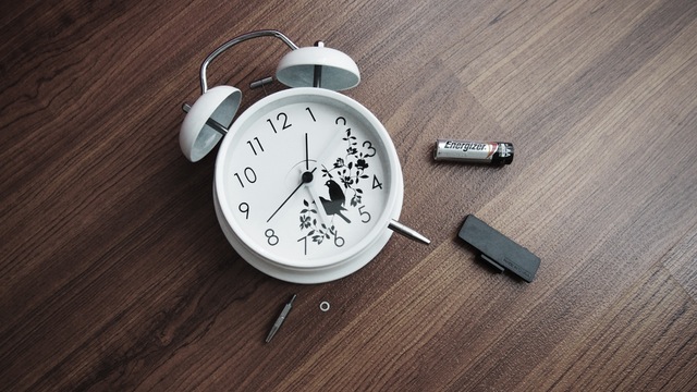 Alarm clock and battery