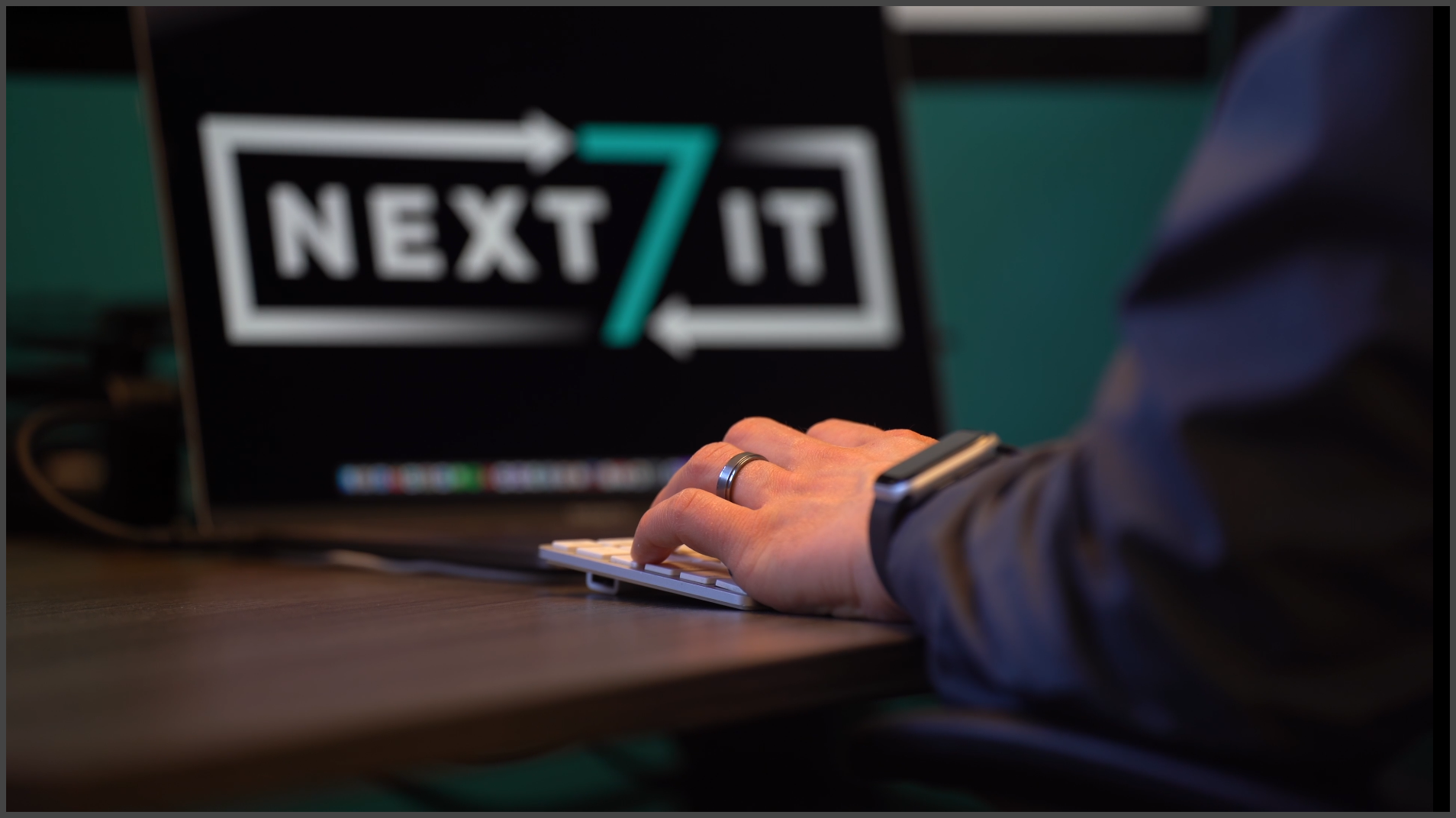Next7 IT services technician assisting a small business client.